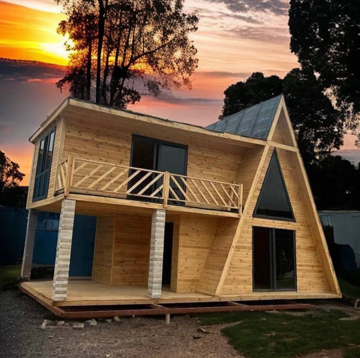 The meme is an image of a small, two-story wooden house with a large, sloping roof and a deck on the second floor. The text "I'm not lazy, I'm just on energy-saving mode" appears in the image, implying that the house is so small and efficient that it doesn't need to use much energy. The humor comes from the idea that the house is so tiny and efficient that it's like a person who is just conserving energy.